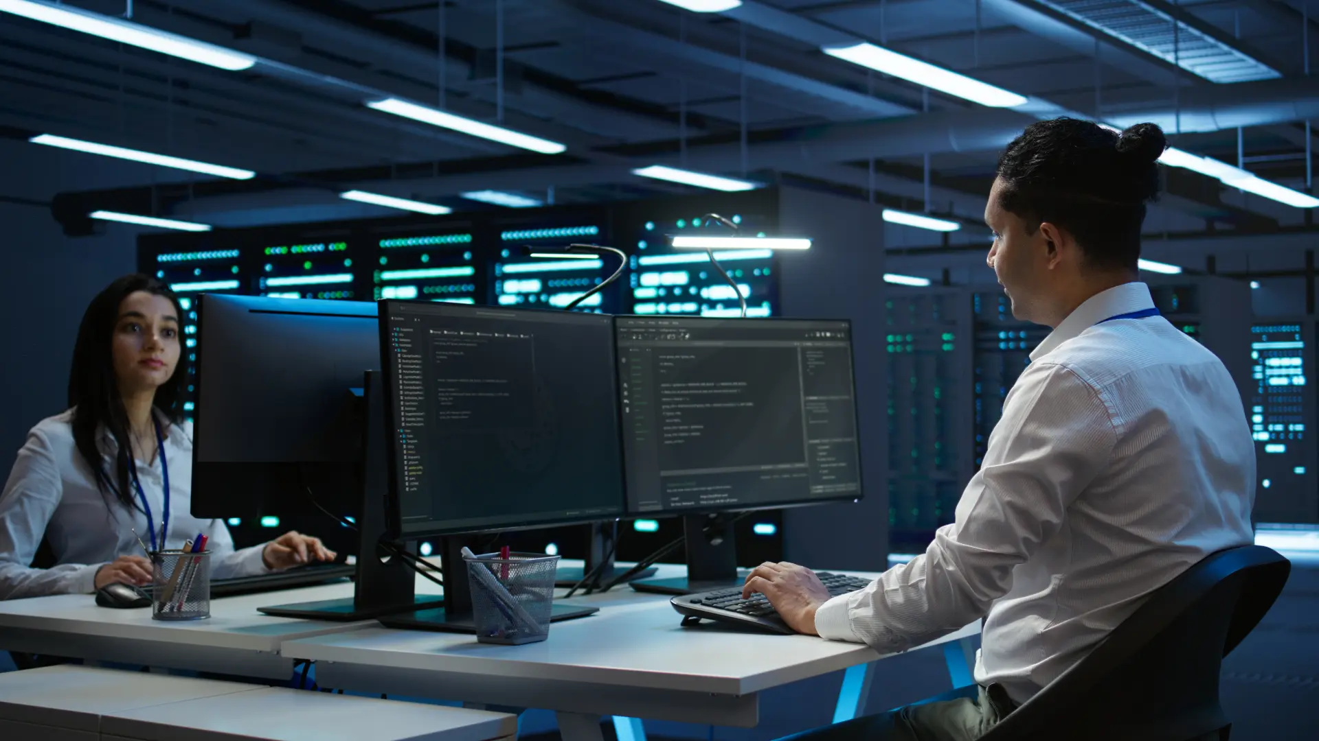 Portrait cheerful engineer data center installing software computer